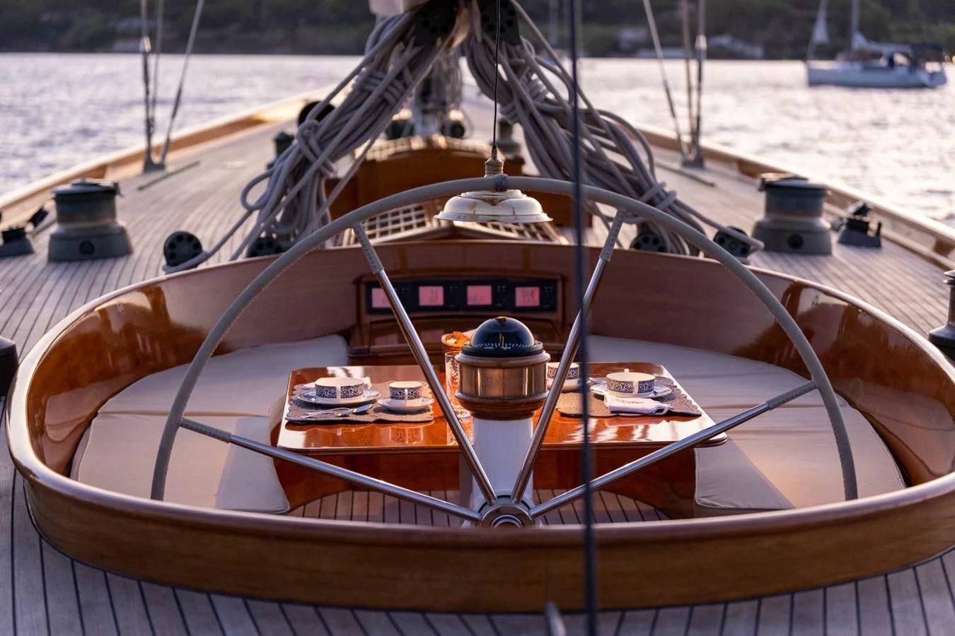 a wooden steering wheel on a boat aboard SAVANNAH Yacht for Sale