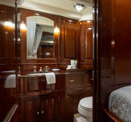 a bathroom with a sink and toilet aboard SAVANNAH Yacht for Sale