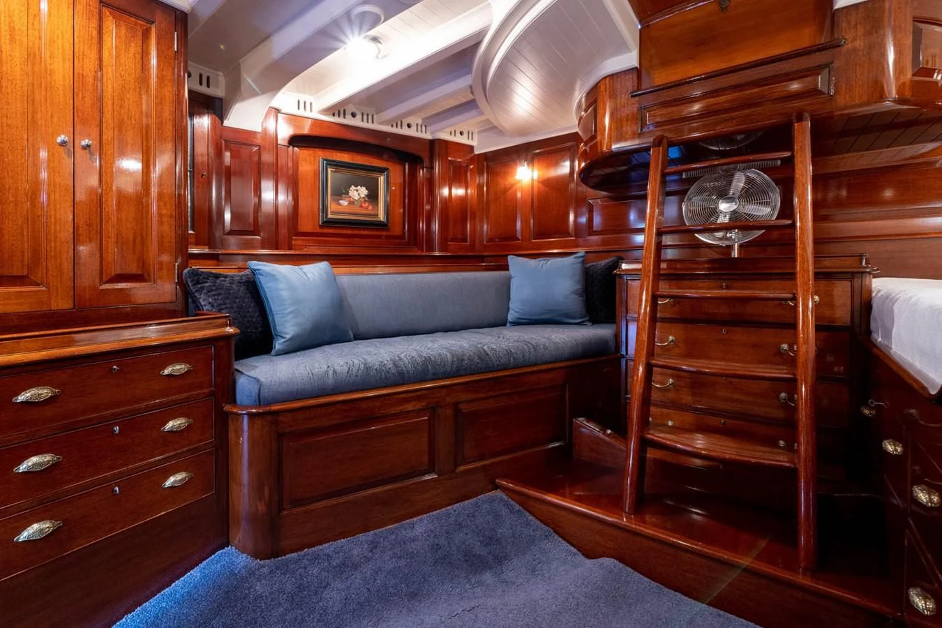 a living room with a couch and a bed aboard SAVANNAH Yacht for Sale