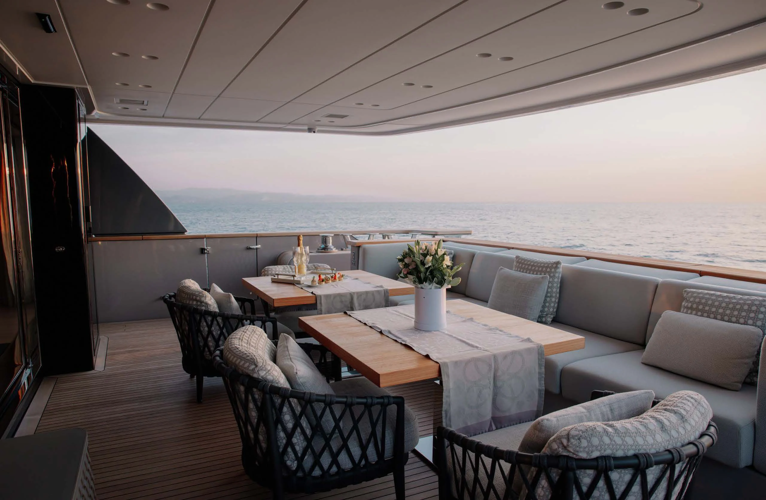 a room with a table and chairs aboard AMIGA Yacht for Sale