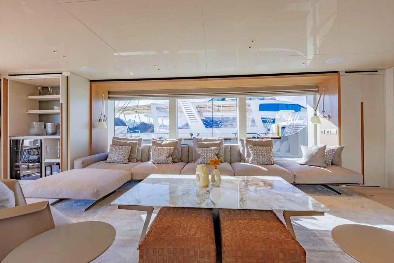 a living room with a large window aboard AMIGA Yacht for Sale