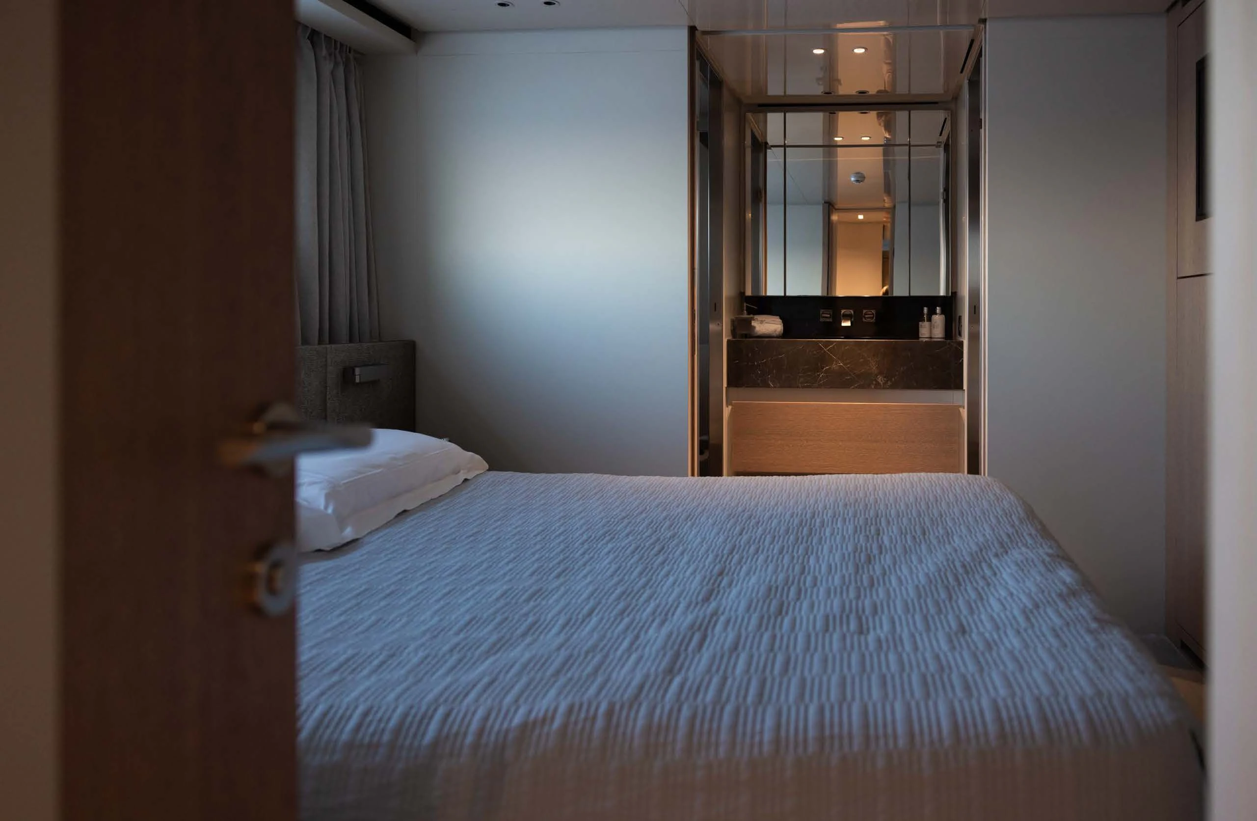 a bed in a room aboard AMIGA Yacht for Sale