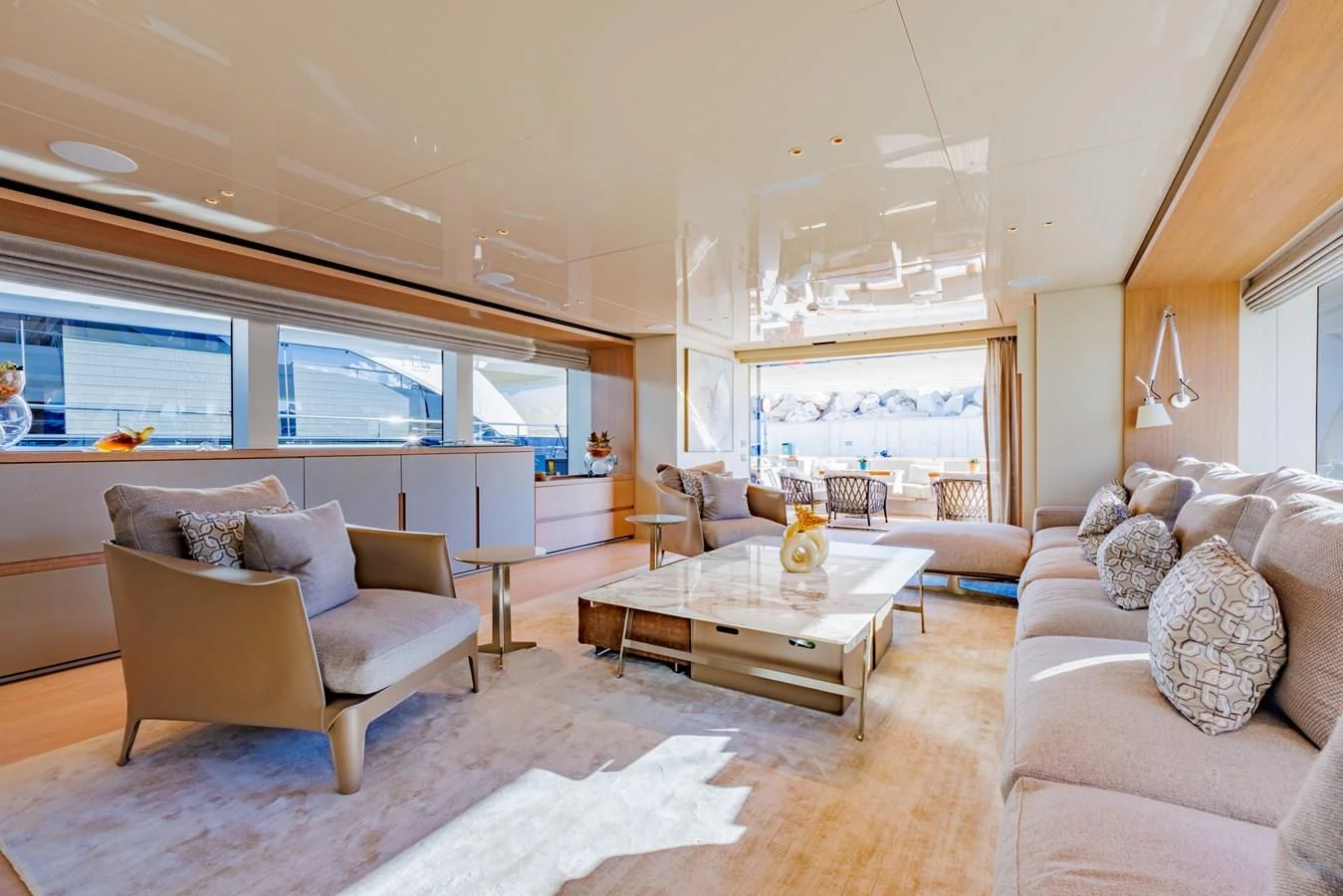 a living room with a large window aboard AMIGA Yacht for Sale