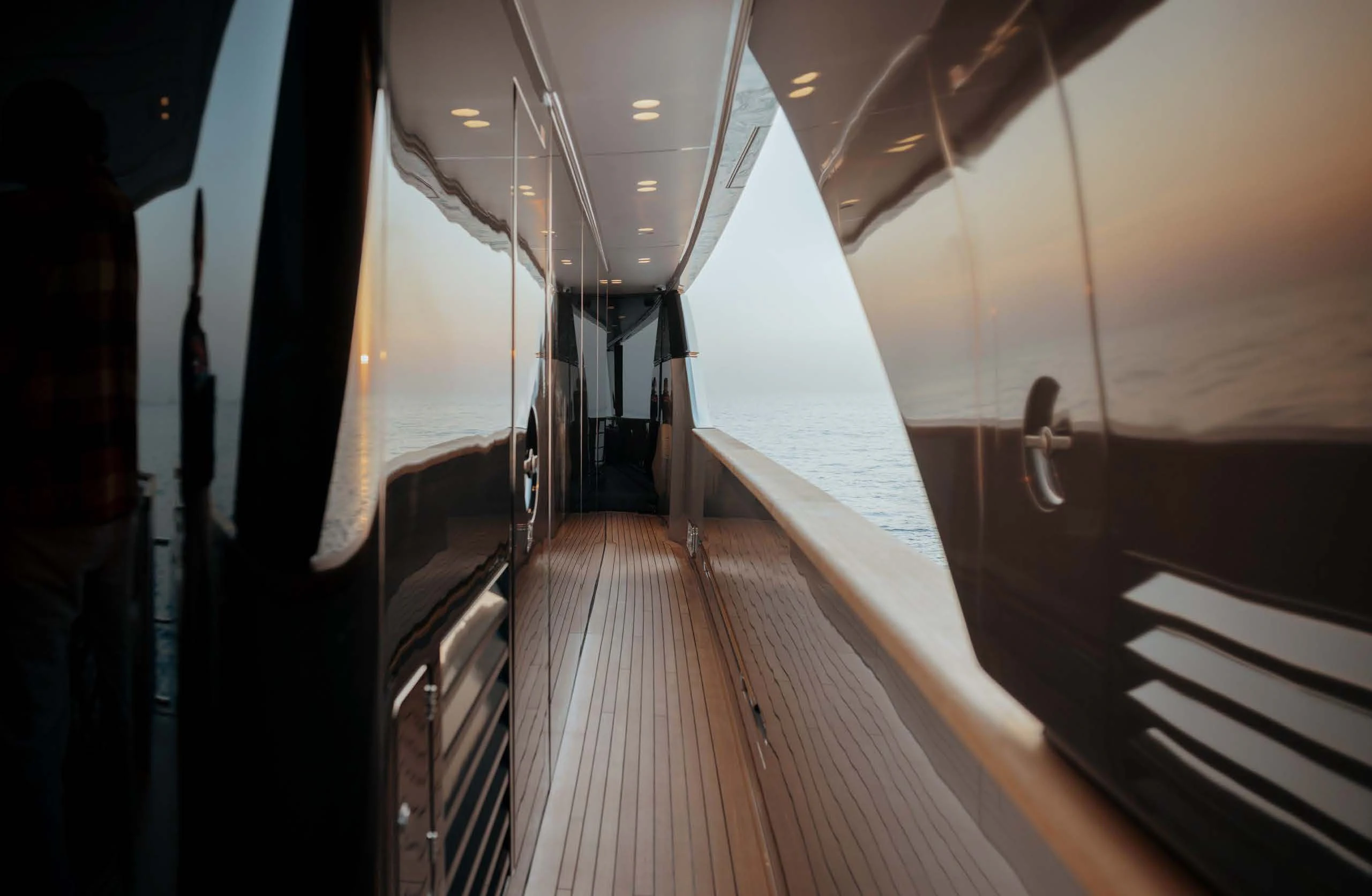 a long wooden walkway aboard AMIGA Yacht for Sale