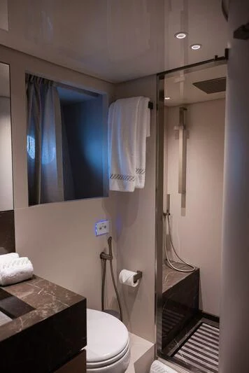 a bathroom with a sink and toilet aboard AMIGA Yacht for Sale