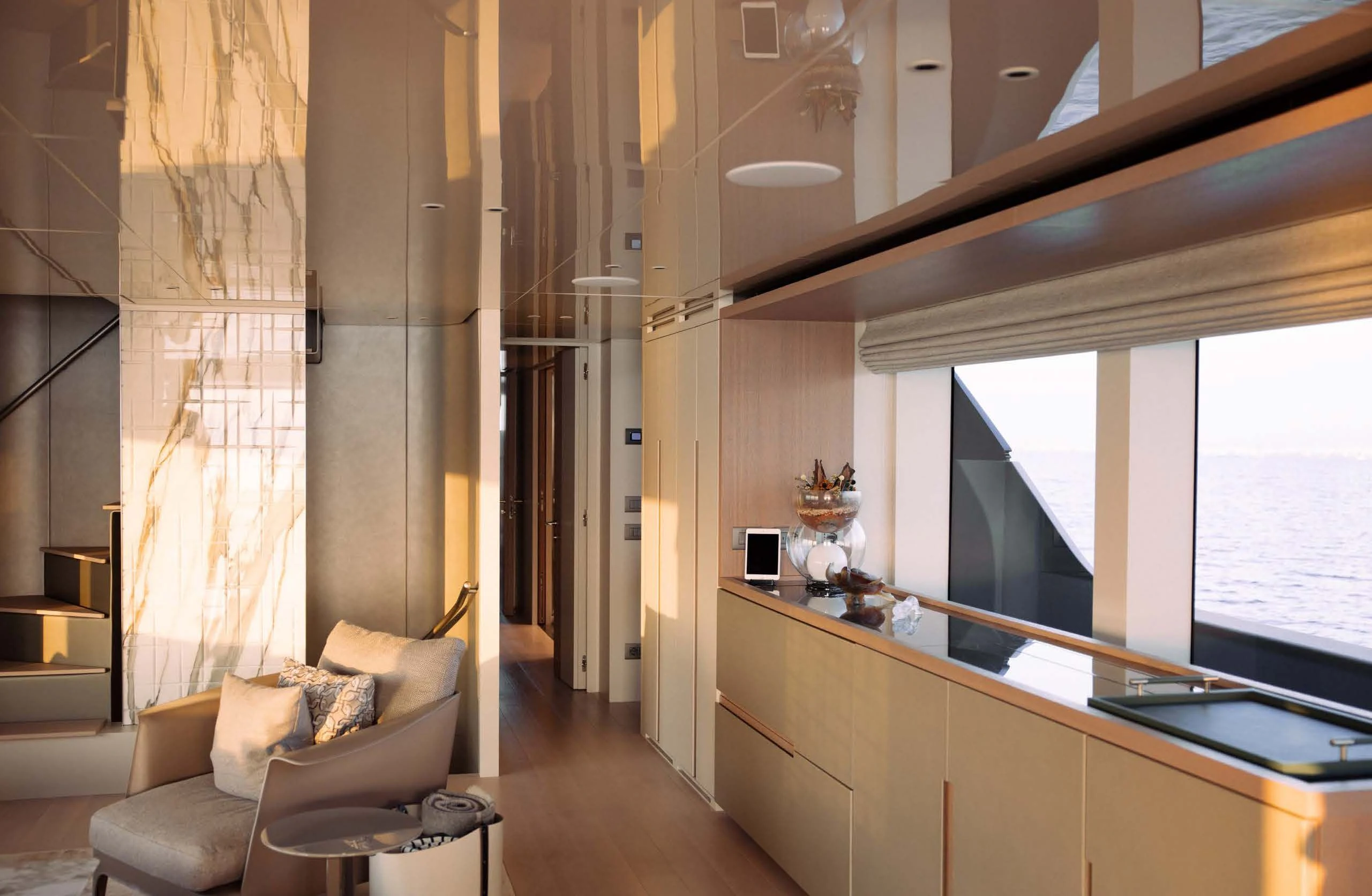 a room with a couch and a window aboard AMIGA Yacht for Sale