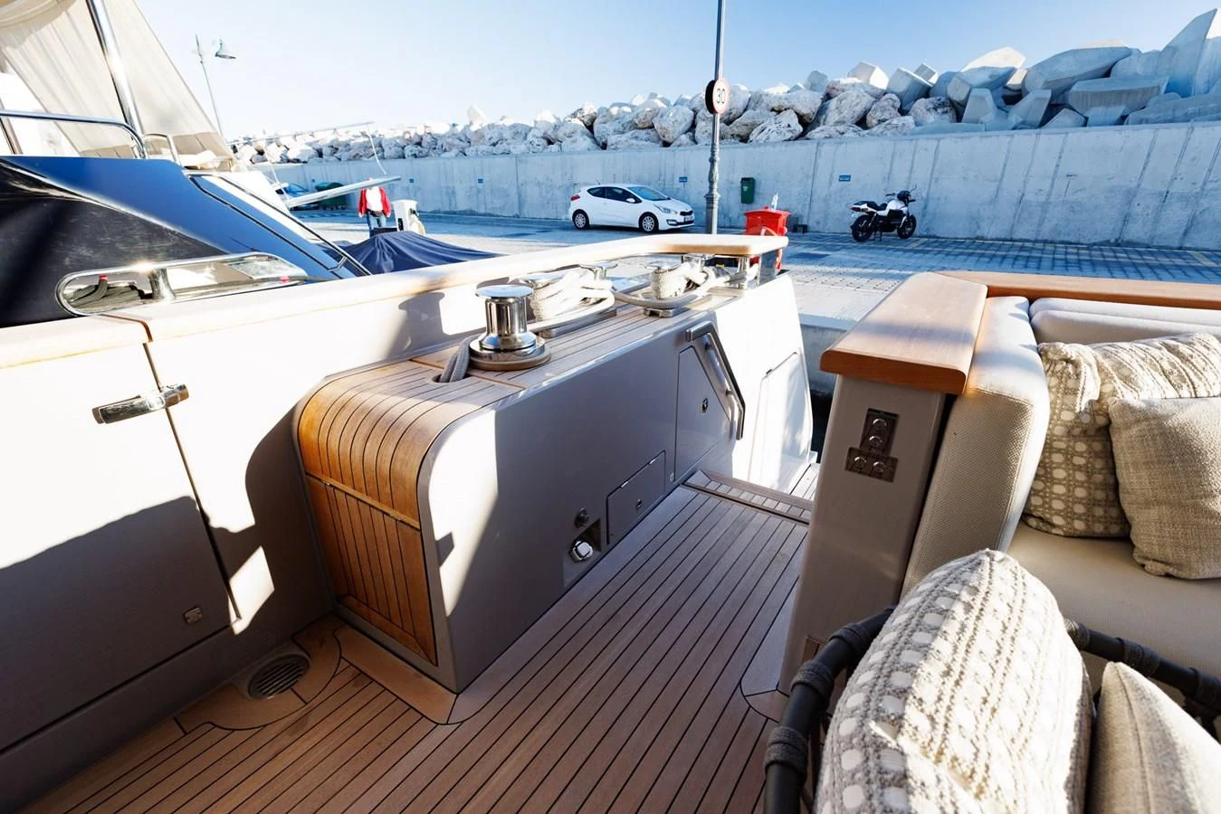 a boat with a large boat in the background aboard AMIGA Yacht for Sale