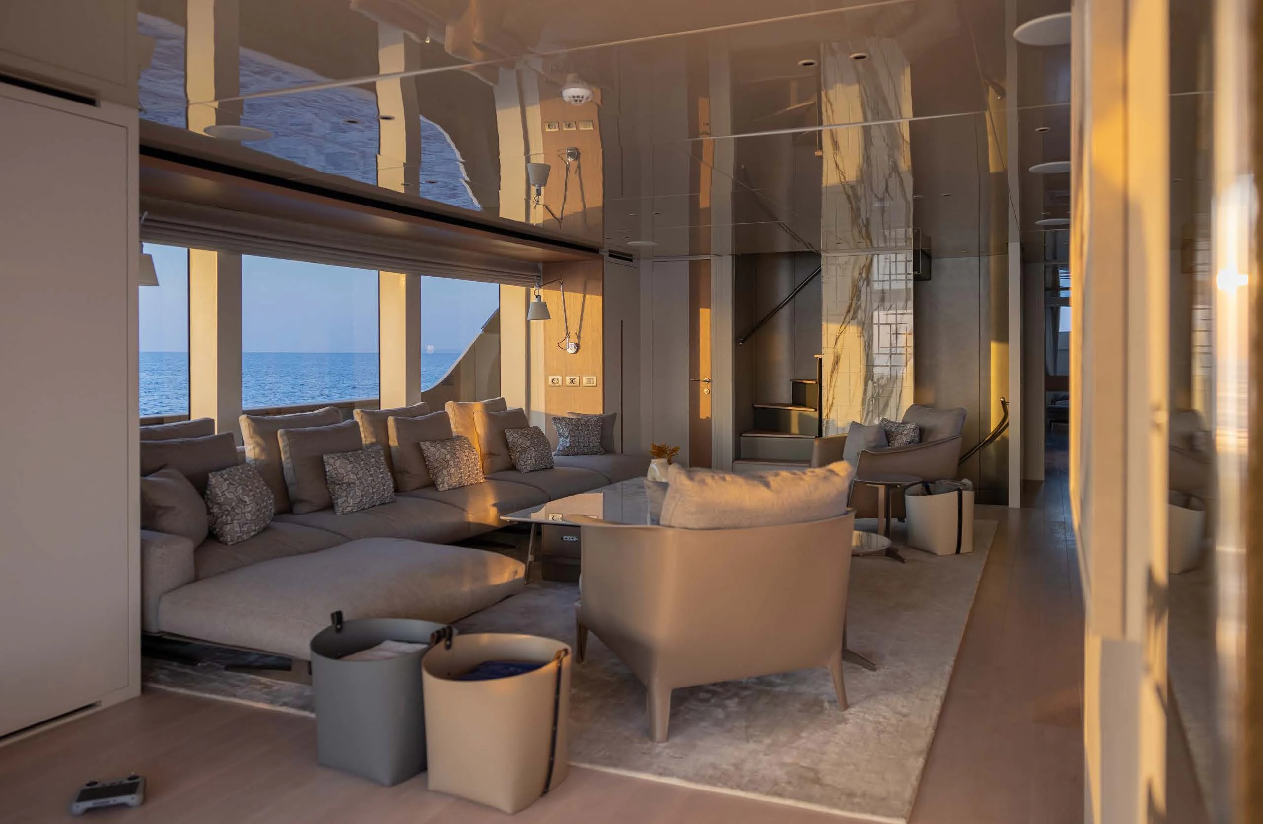 a living room with a large window aboard AMIGA Yacht for Sale