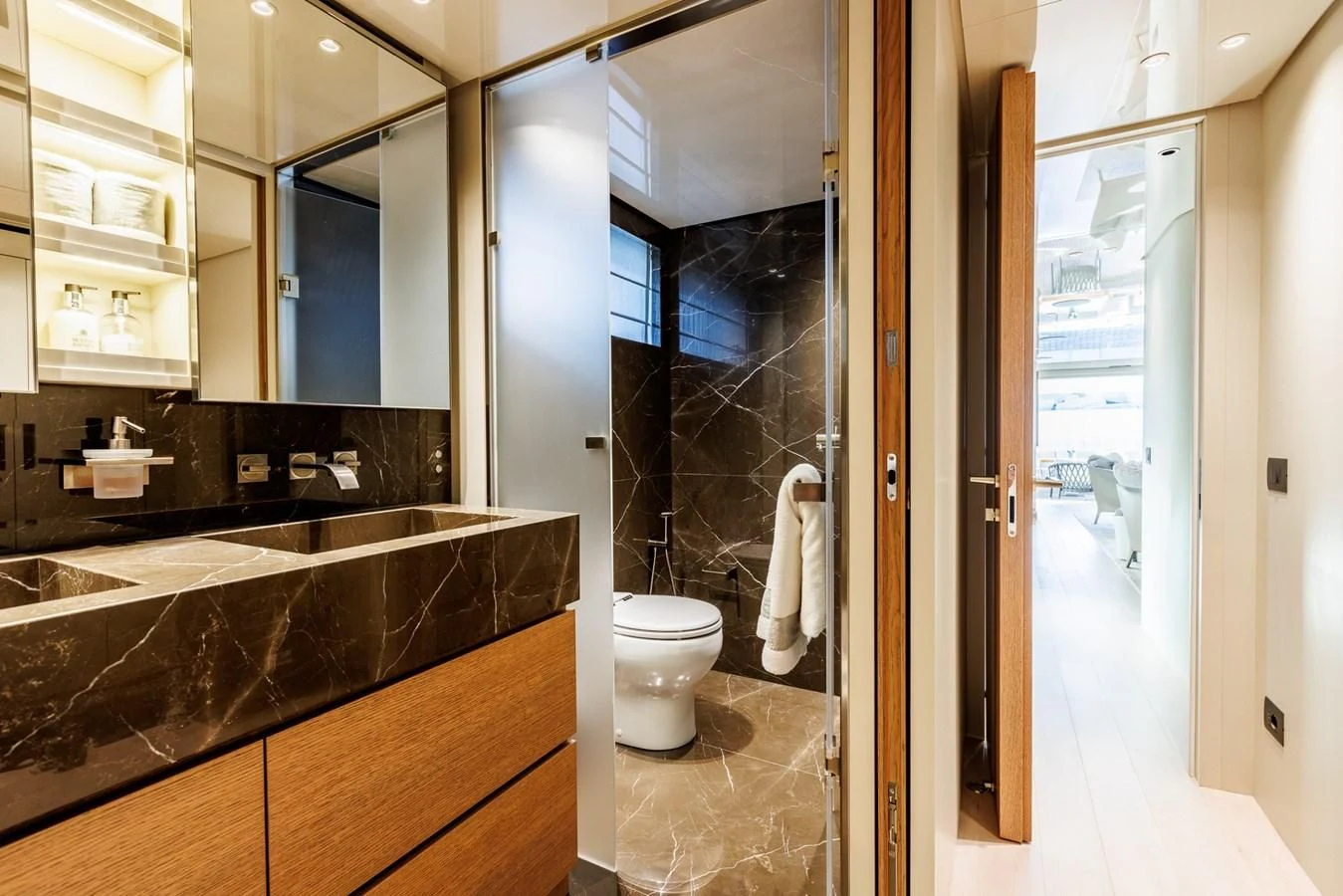 a bathroom with a marble counter top aboard AMIGA Yacht for Sale