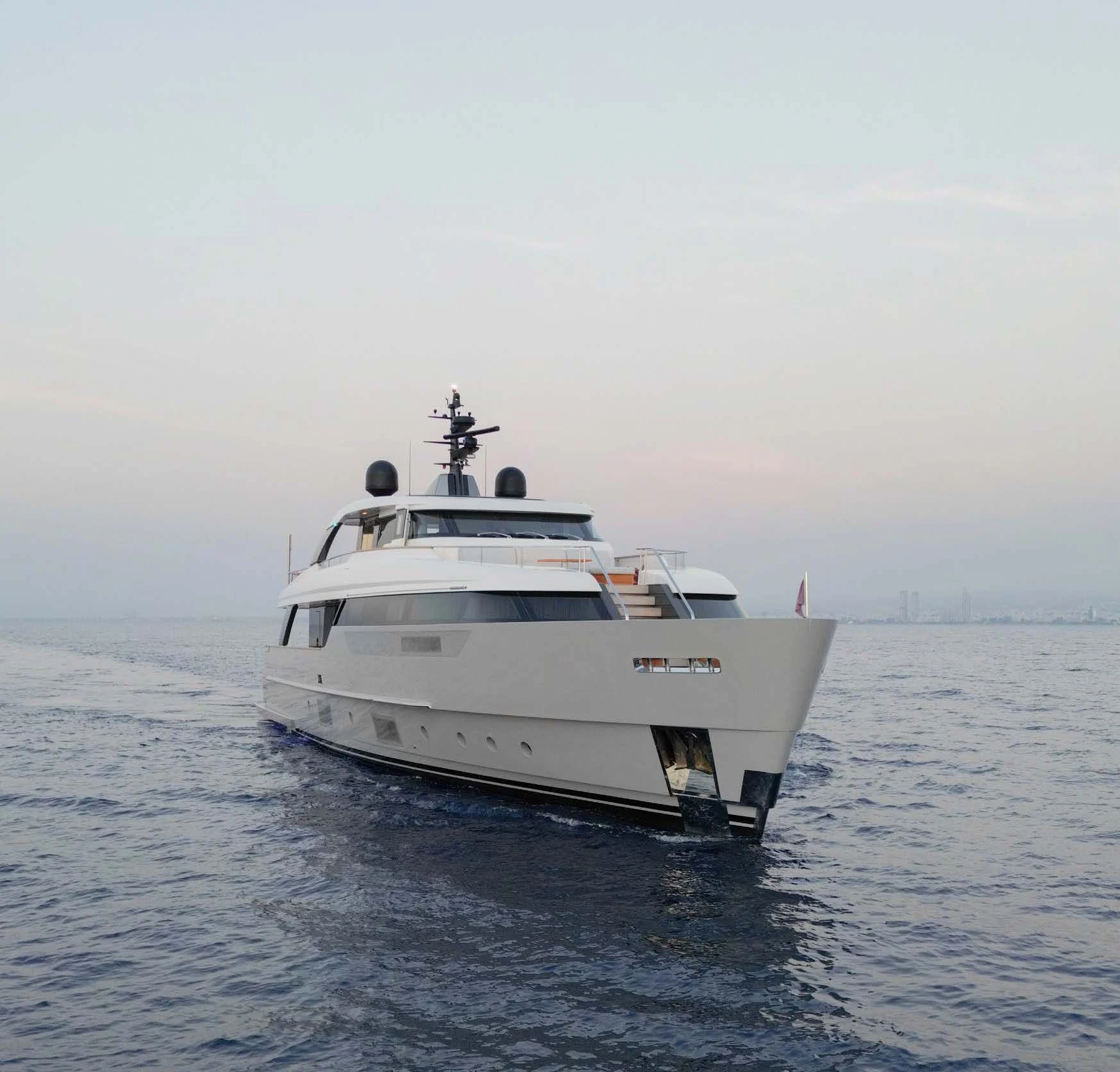 a white yacht in the water aboard AMIGA Yacht for Sale