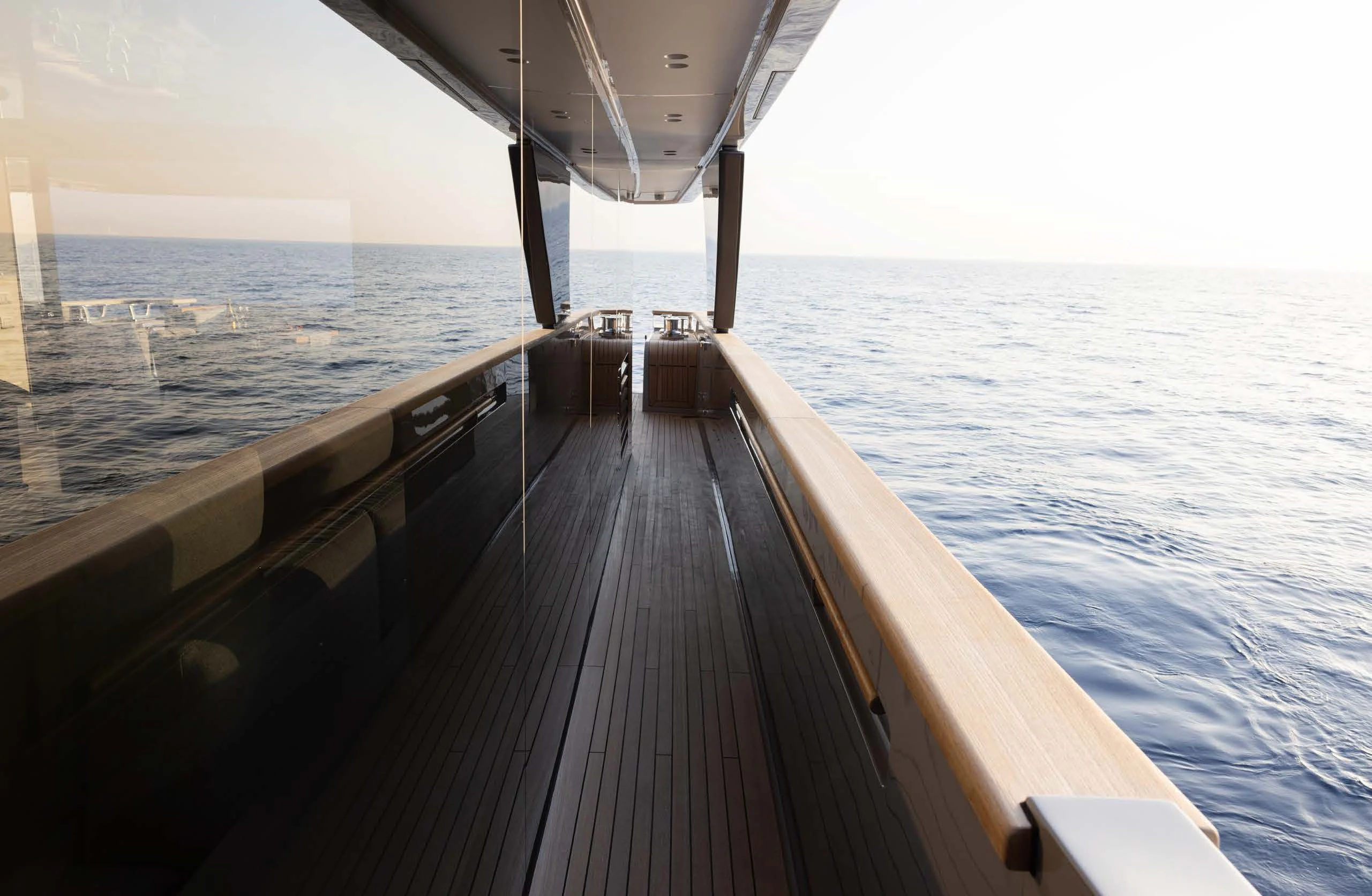 a wooden dock over the water aboard AMIGA Yacht for Sale