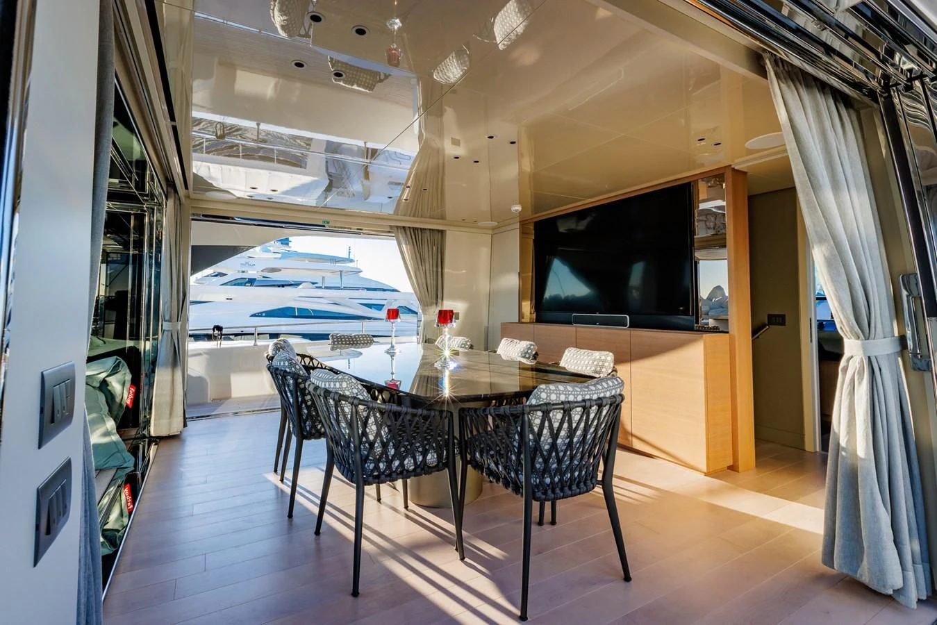 a room with a table and chairs aboard AMIGA Yacht for Sale
