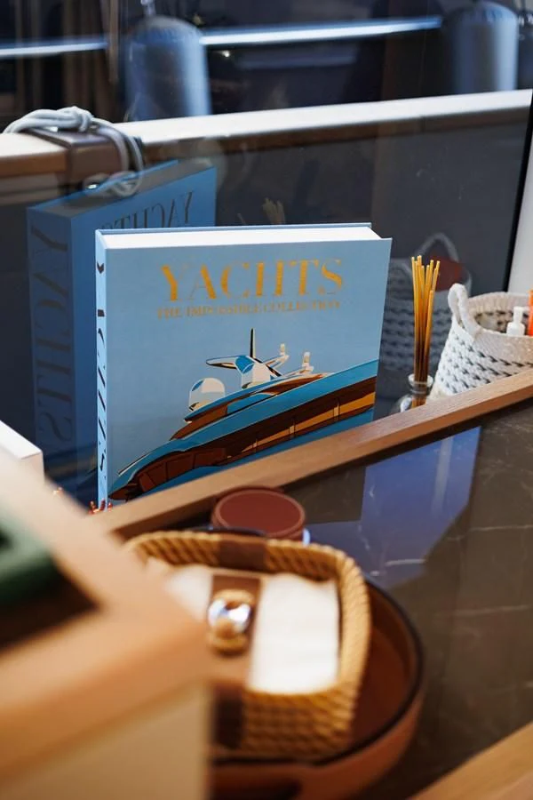 a sign on a table aboard AMIGA Yacht for Sale