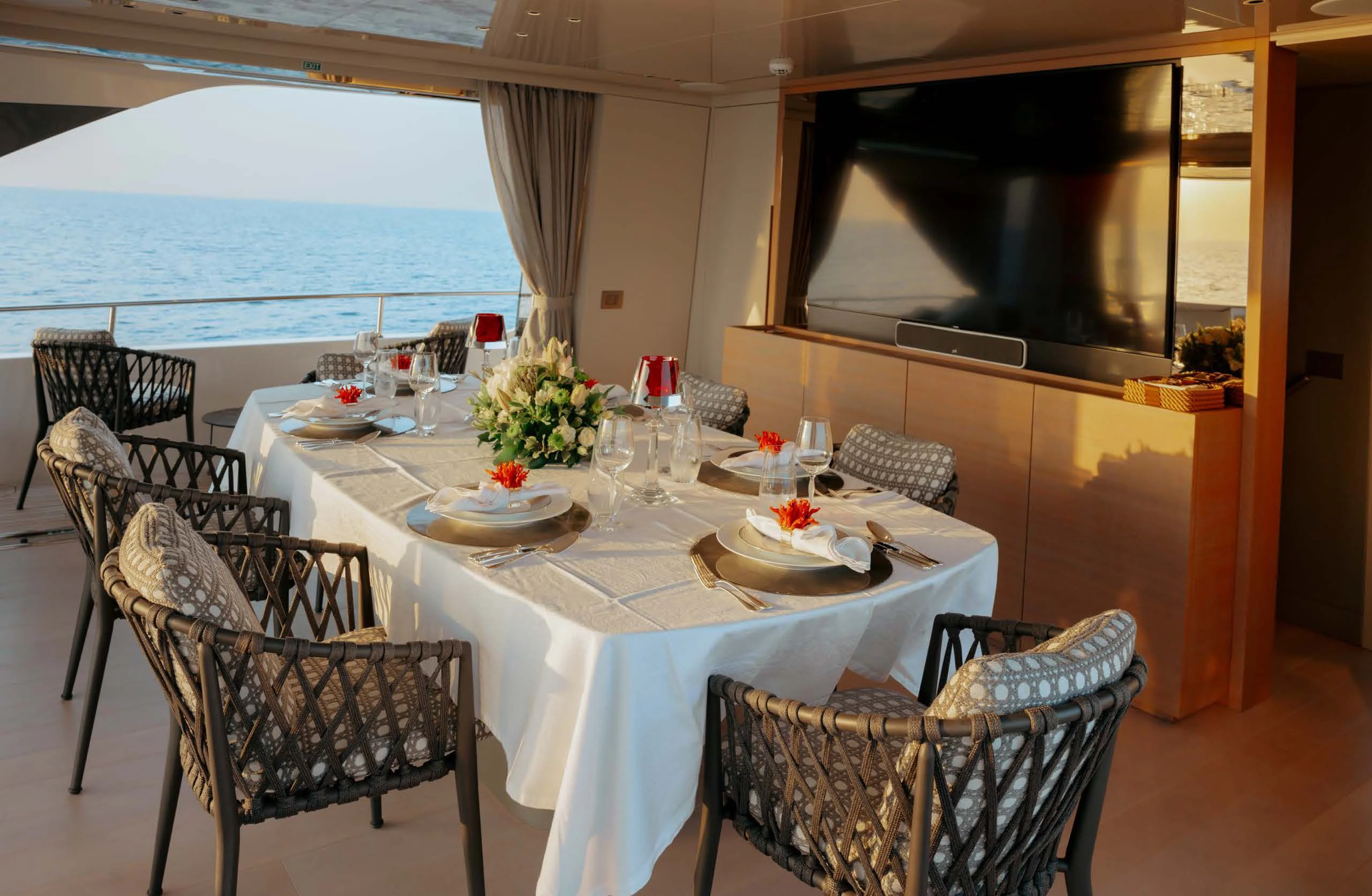 a table set for a dinner aboard AMIGA Yacht for Sale