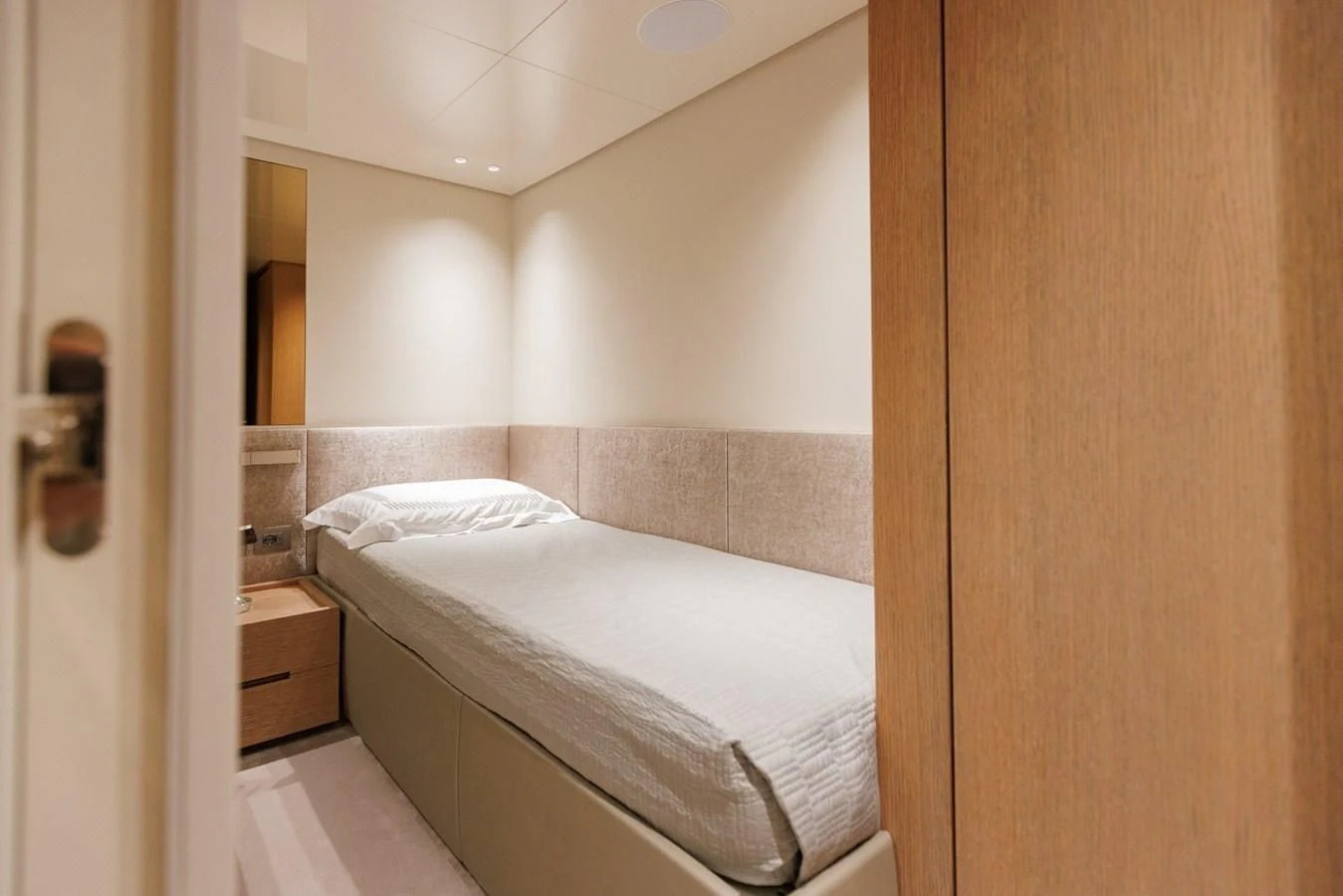 a bed in a room aboard AMIGA Yacht for Sale