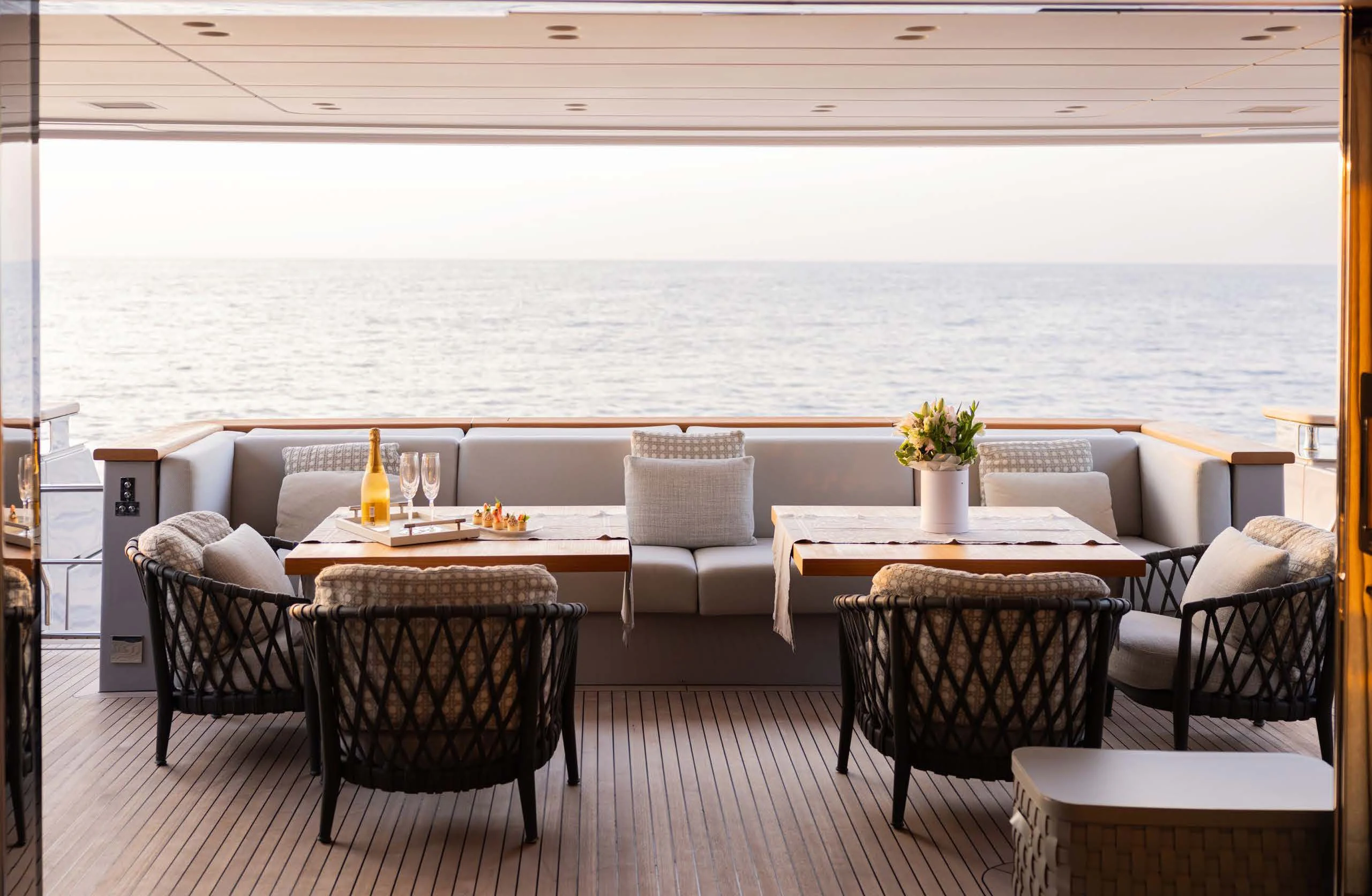 a room with a table and chairs aboard AMIGA Yacht for Sale