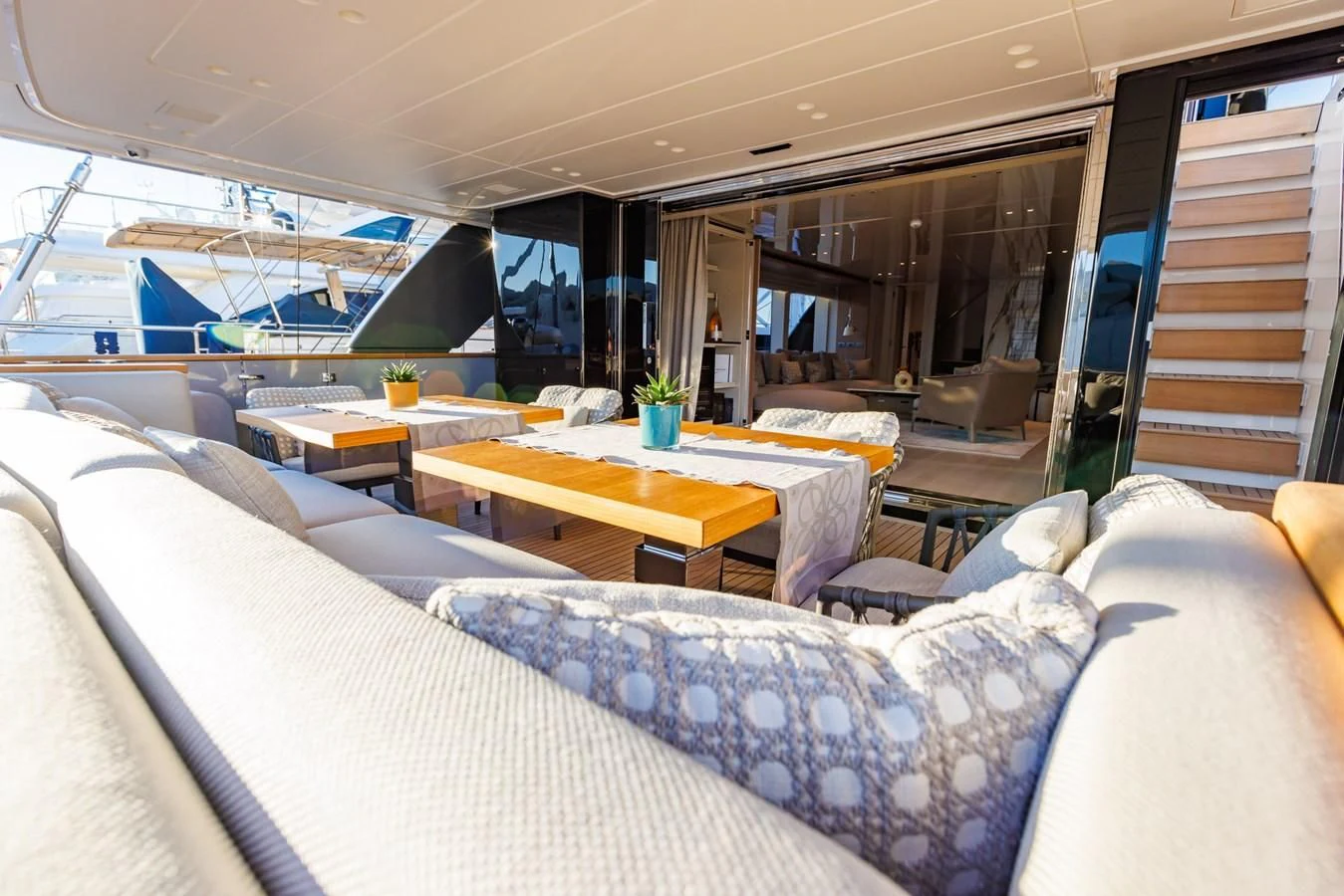 a room with a bed and a table aboard AMIGA Yacht for Sale
