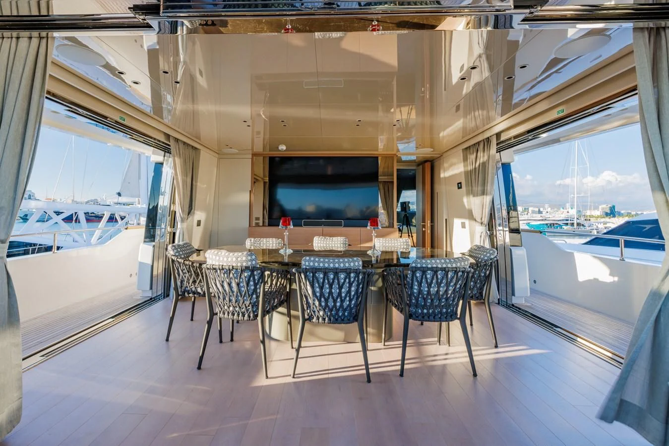 a room with a table and chairs aboard AMIGA Yacht for Sale
