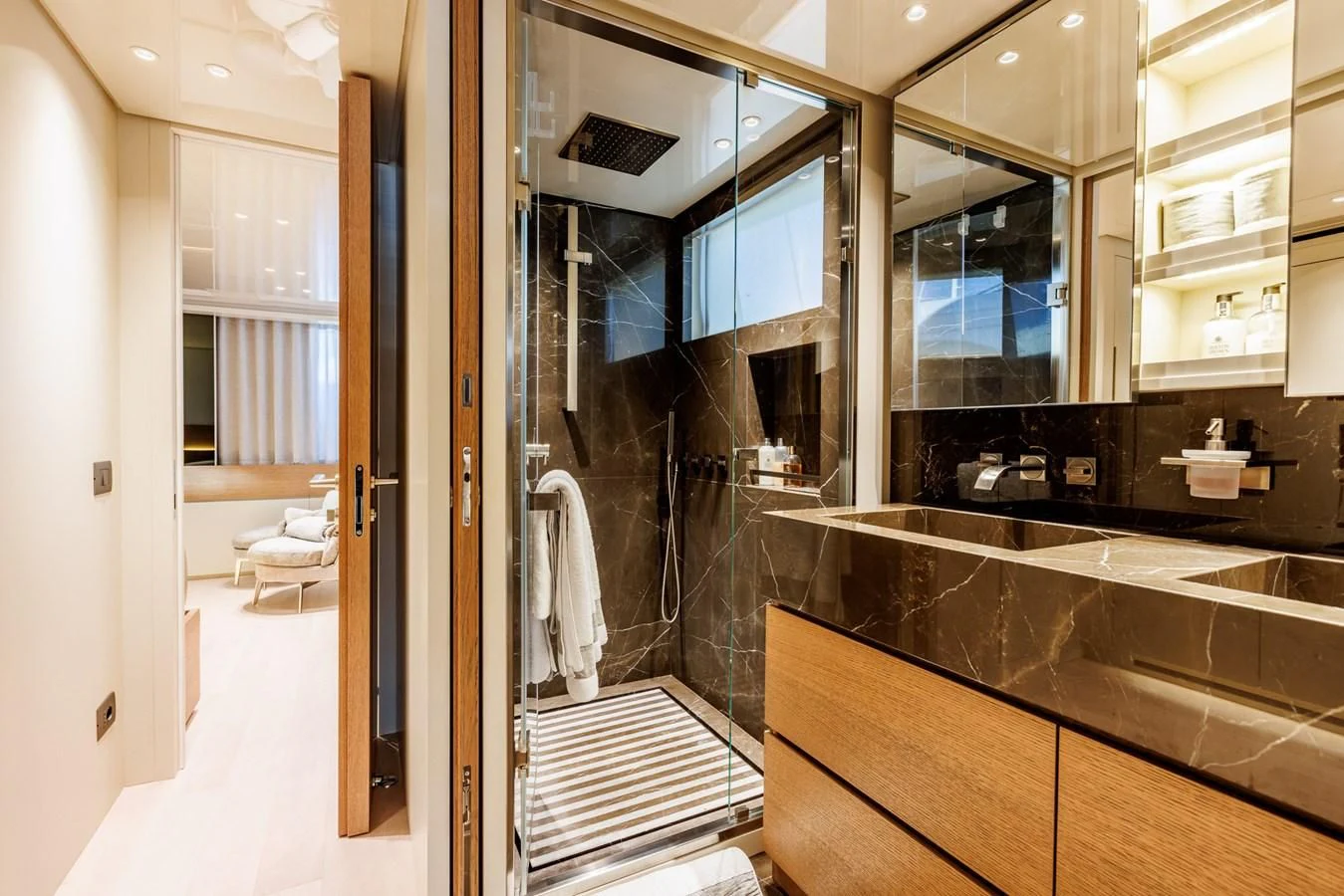 a bathroom with a glass shower aboard AMIGA Yacht for Sale