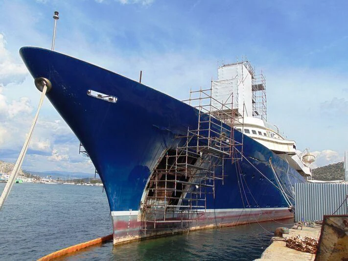 a large ship docked aboard NAVTILVS Yacht for Sale