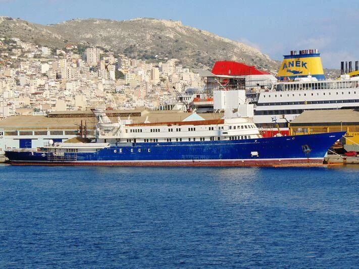 a large ship in the water aboard NAVTILVS Yacht for Sale