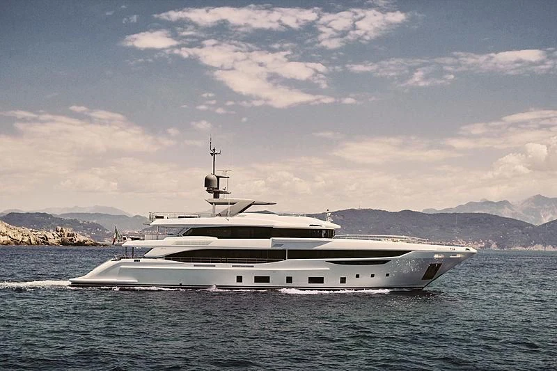a white yacht in the water aboard ANURAG Yacht for Sale