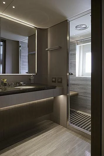 a bathroom with a large mirror aboard ANURAG Yacht for Sale