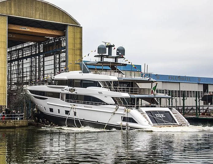 a boat docked at a pier aboard ANURAG Yacht for Sale