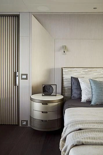 a small bedroom with a small bed aboard ANURAG Yacht for Sale
