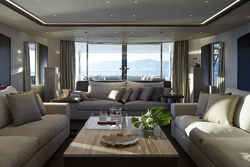 a living room with a large window aboard ANURAG Yacht for Sale