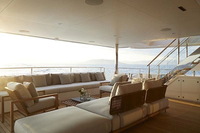 a living room with a large window aboard ANURAG Yacht for Sale