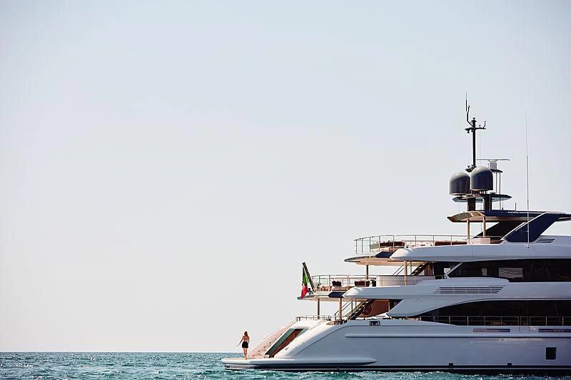 a boat docked at a pier aboard ANURAG Yacht for Sale