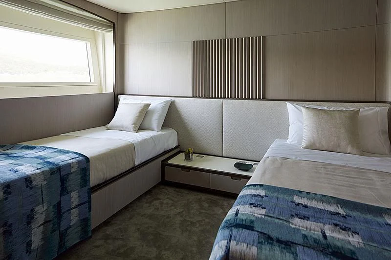 a couple of beds in a room aboard ANURAG Yacht for Sale