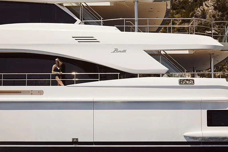 a person walking on a boat aboard ANURAG Yacht for Sale