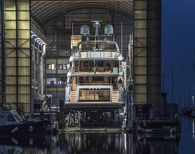 a large ship in a harbor aboard ANURAG Yacht for Sale