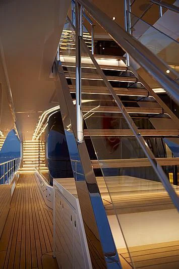 a staircase with a railing aboard ANURAG Yacht for Sale