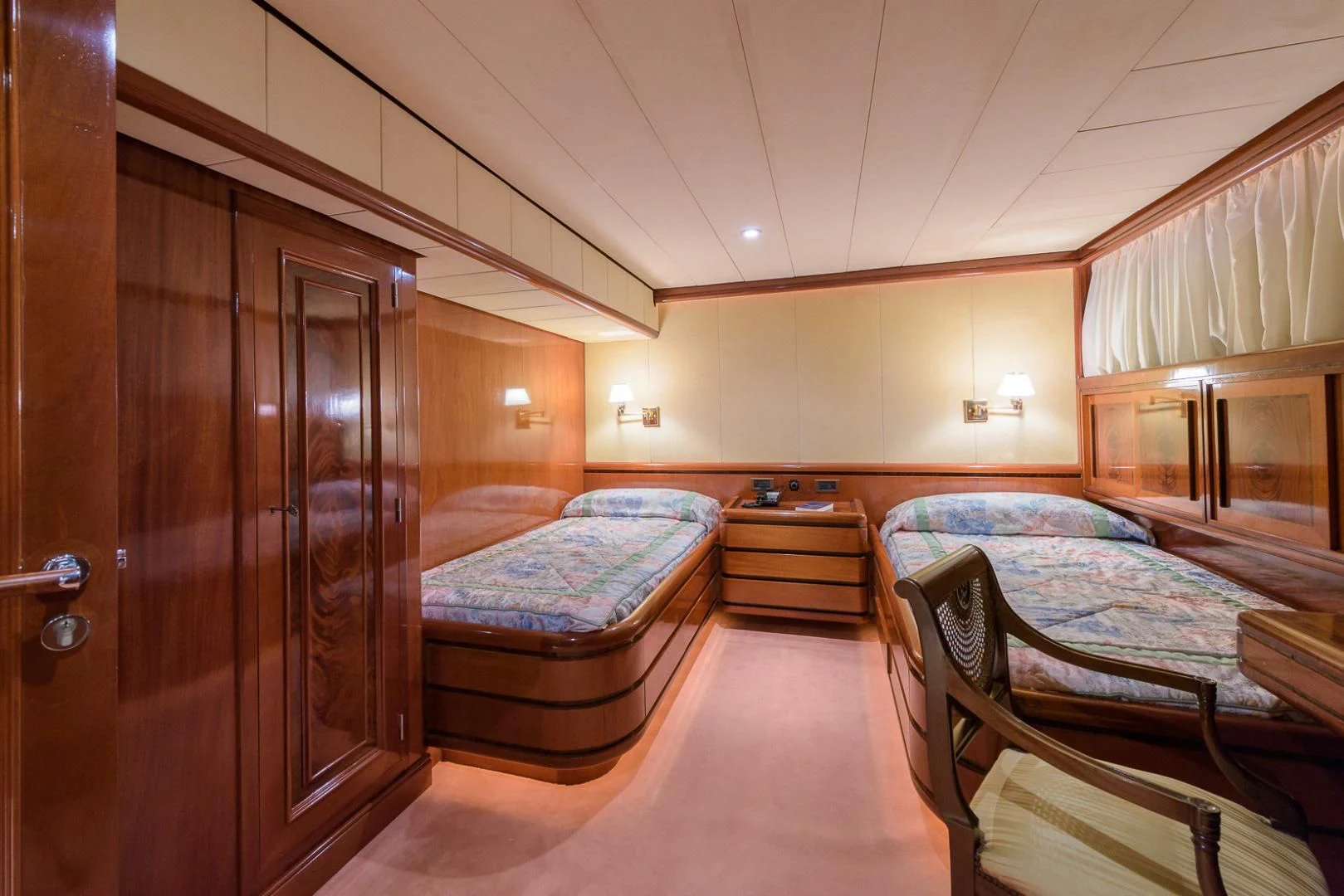 a room with a bed and a closet aboard ELBA Yacht for Sale