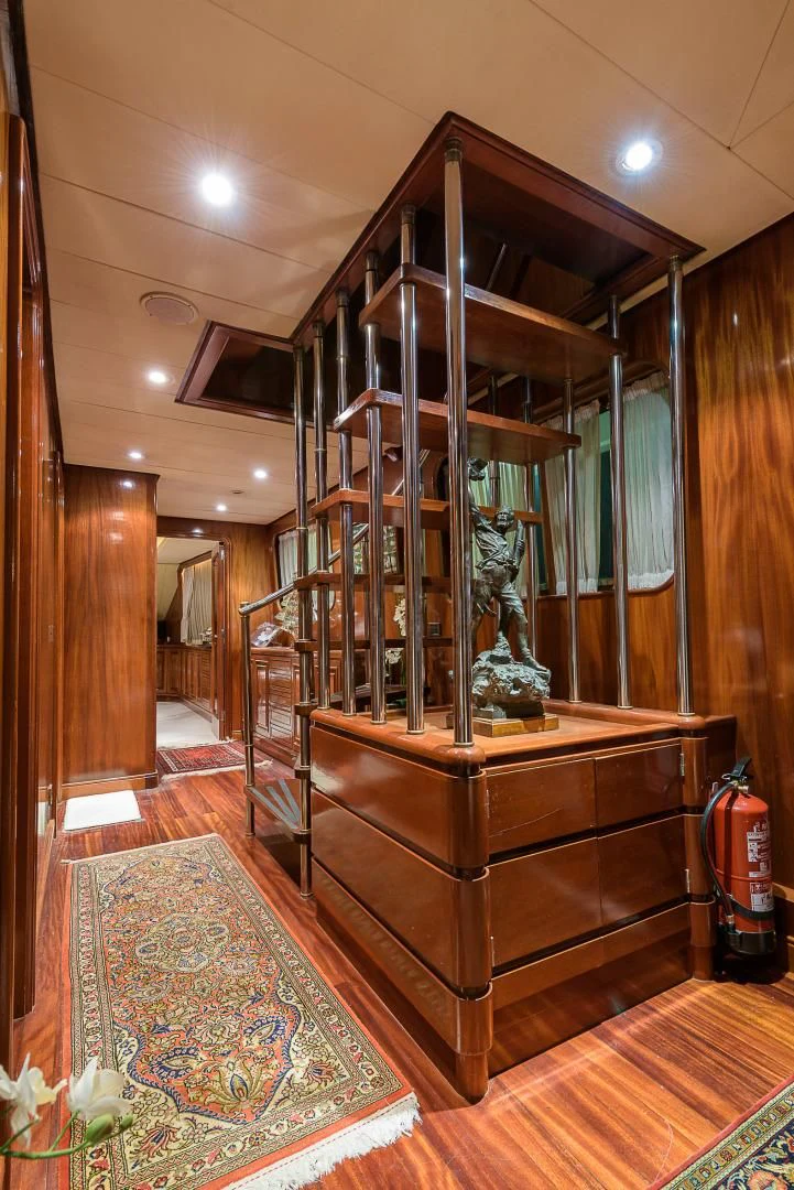a wooden tower with a statue aboard ELBA Yacht for Sale