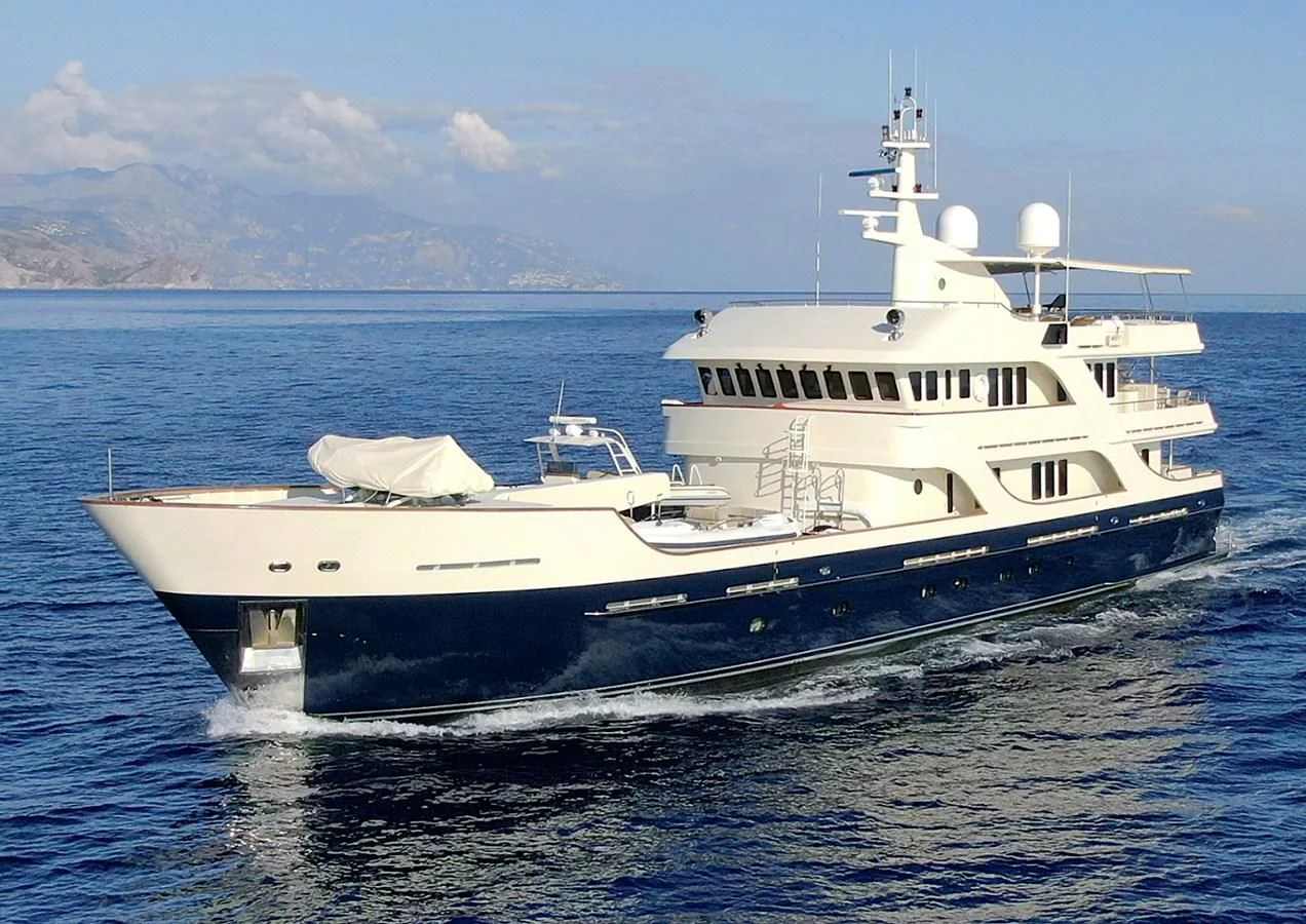 a white yacht in the water aboard LIBERTA Yacht for Sale