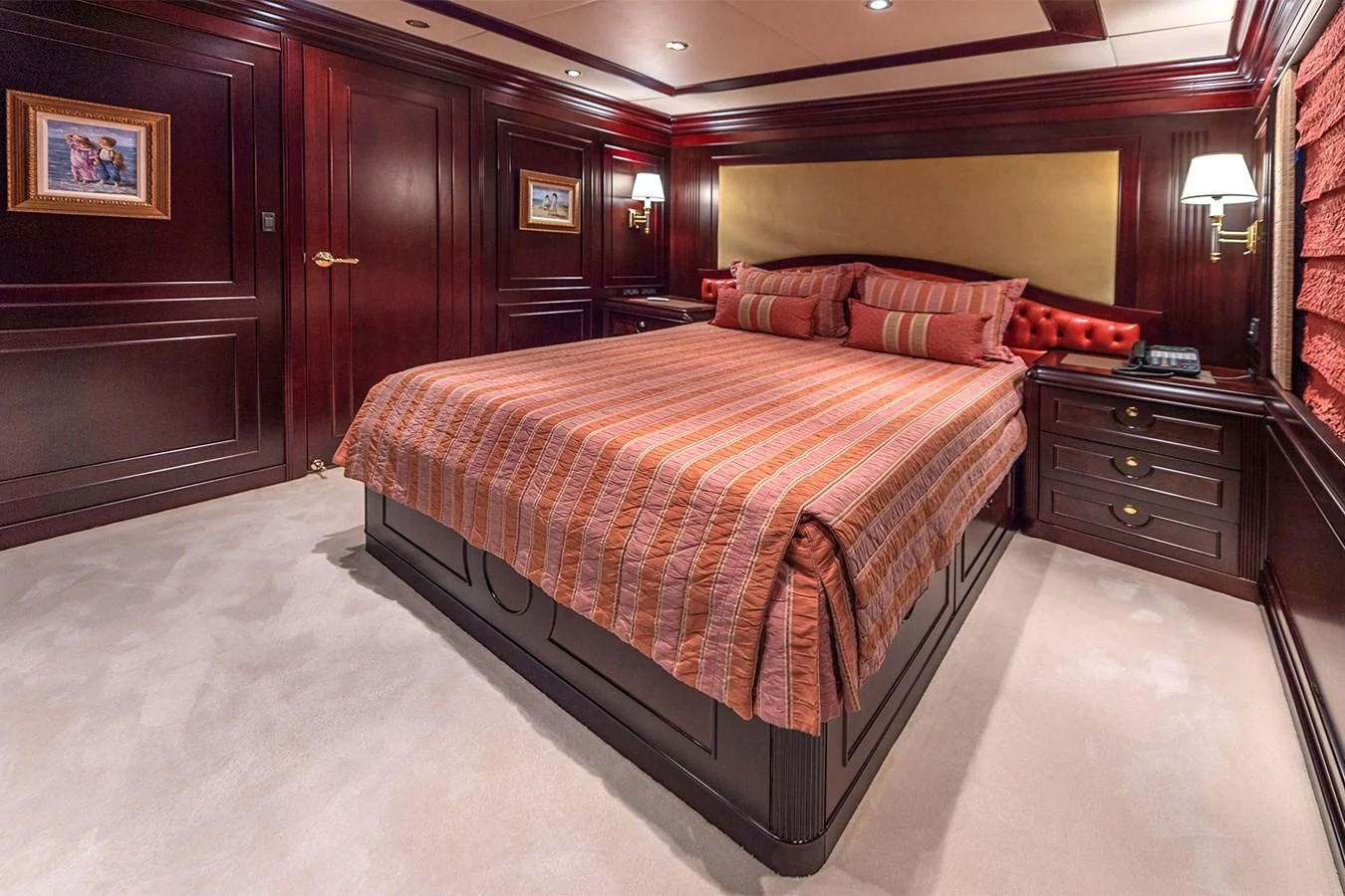 a large bed in a hotel room aboard LIBERTA Yacht for Sale