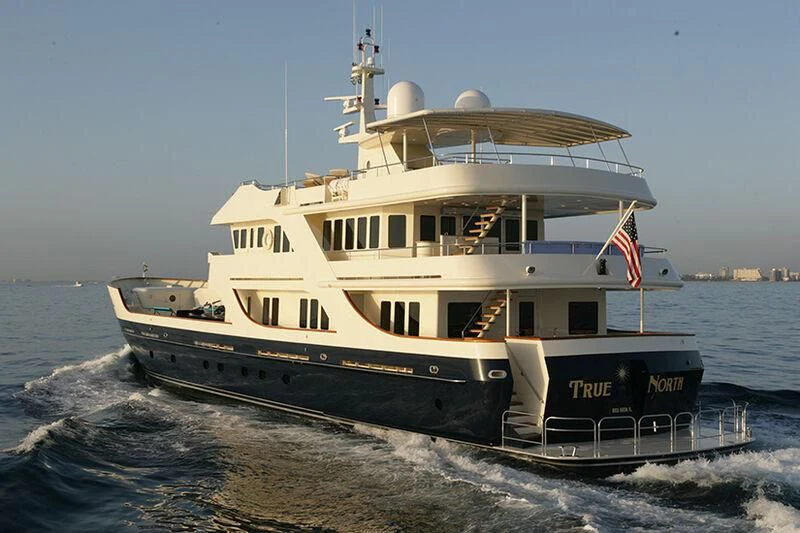 a large boat on the water aboard LIBERTA Yacht for Sale