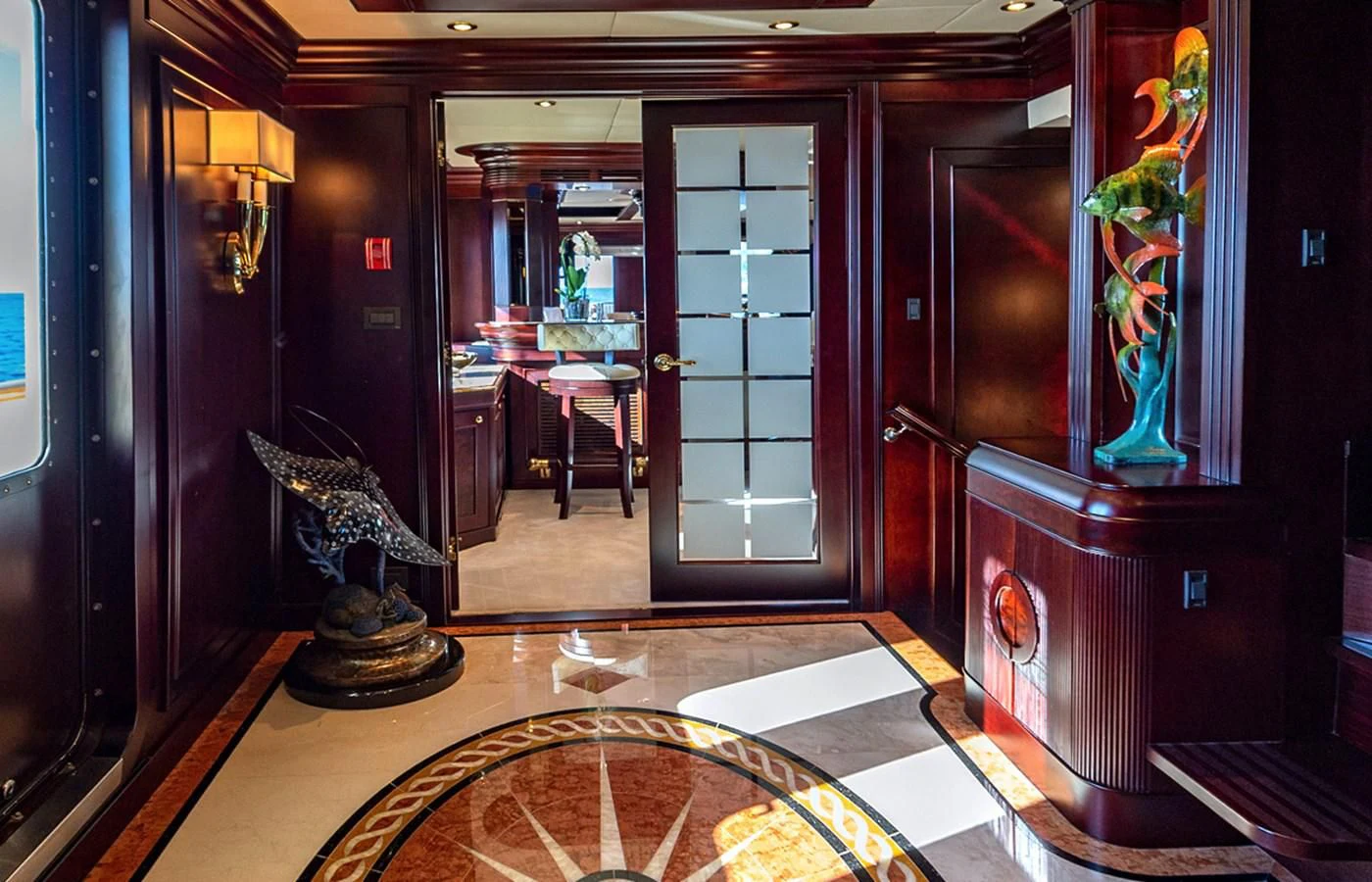 a room with a rug and a table and a rug aboard LIBERTA Yacht for Sale