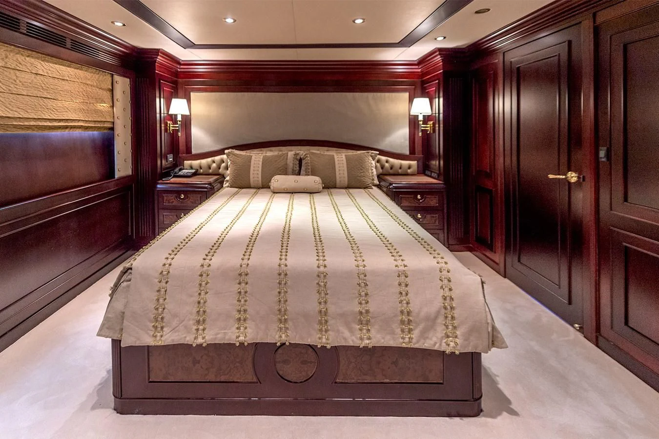 a bed in a room aboard LIBERTA Yacht for Sale