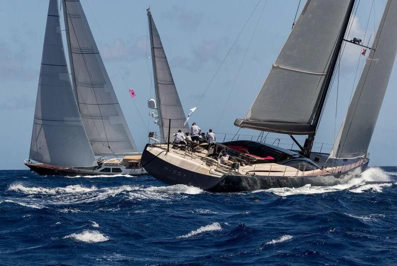 a group of people sailing on a boat aboard PATTOO Yacht for Sale