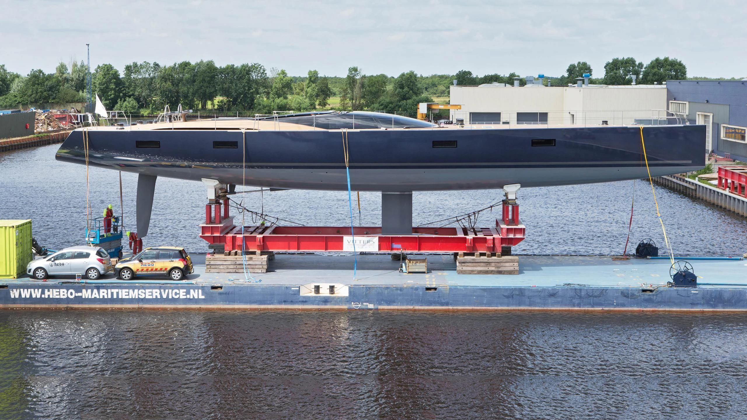 a large boat on a dock aboard PATTOO Yacht for Sale