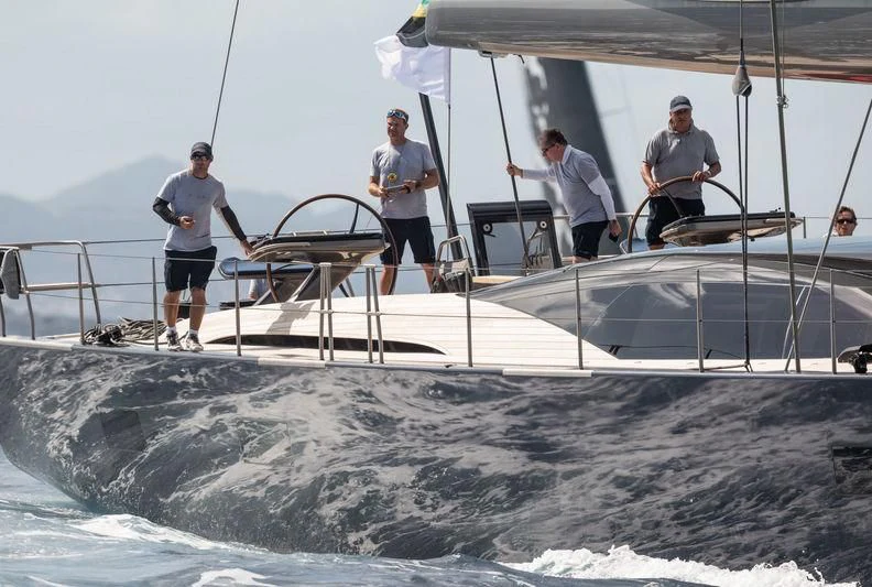 a group of men on a boat aboard PATTOO Yacht for Sale