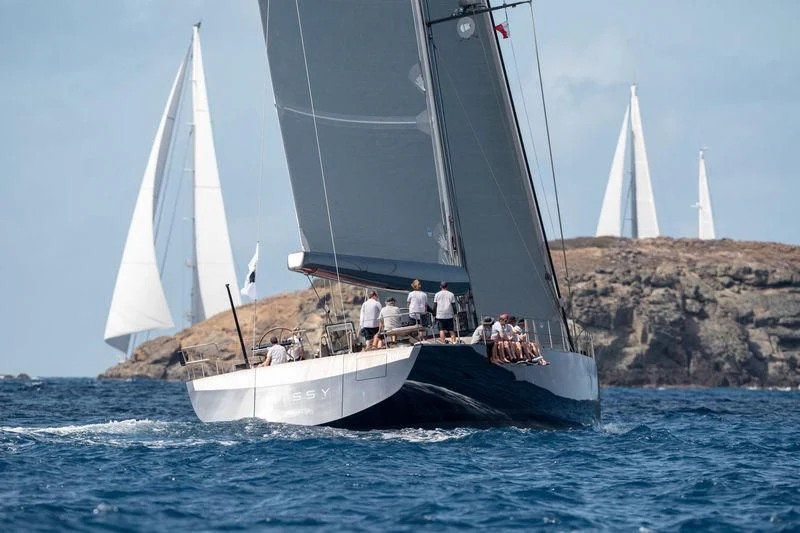 a sailboat with people on it aboard PATTOO Yacht for Sale