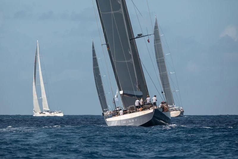 a group of people sailing on a boat aboard PATTOO Yacht for Sale