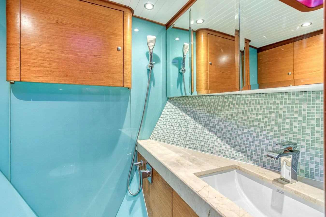 a bathroom with a shower and sink aboard ARIA Yacht for Sale