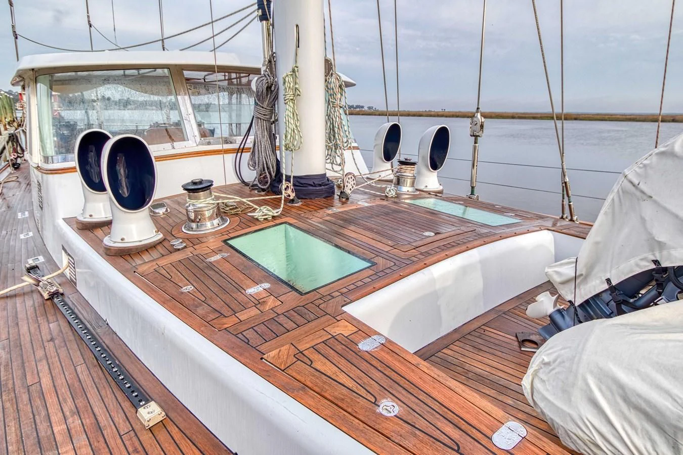 a bathroom with a tub and a sink aboard ARIA Yacht for Sale